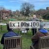 Christina talks to a group of seated plot holders